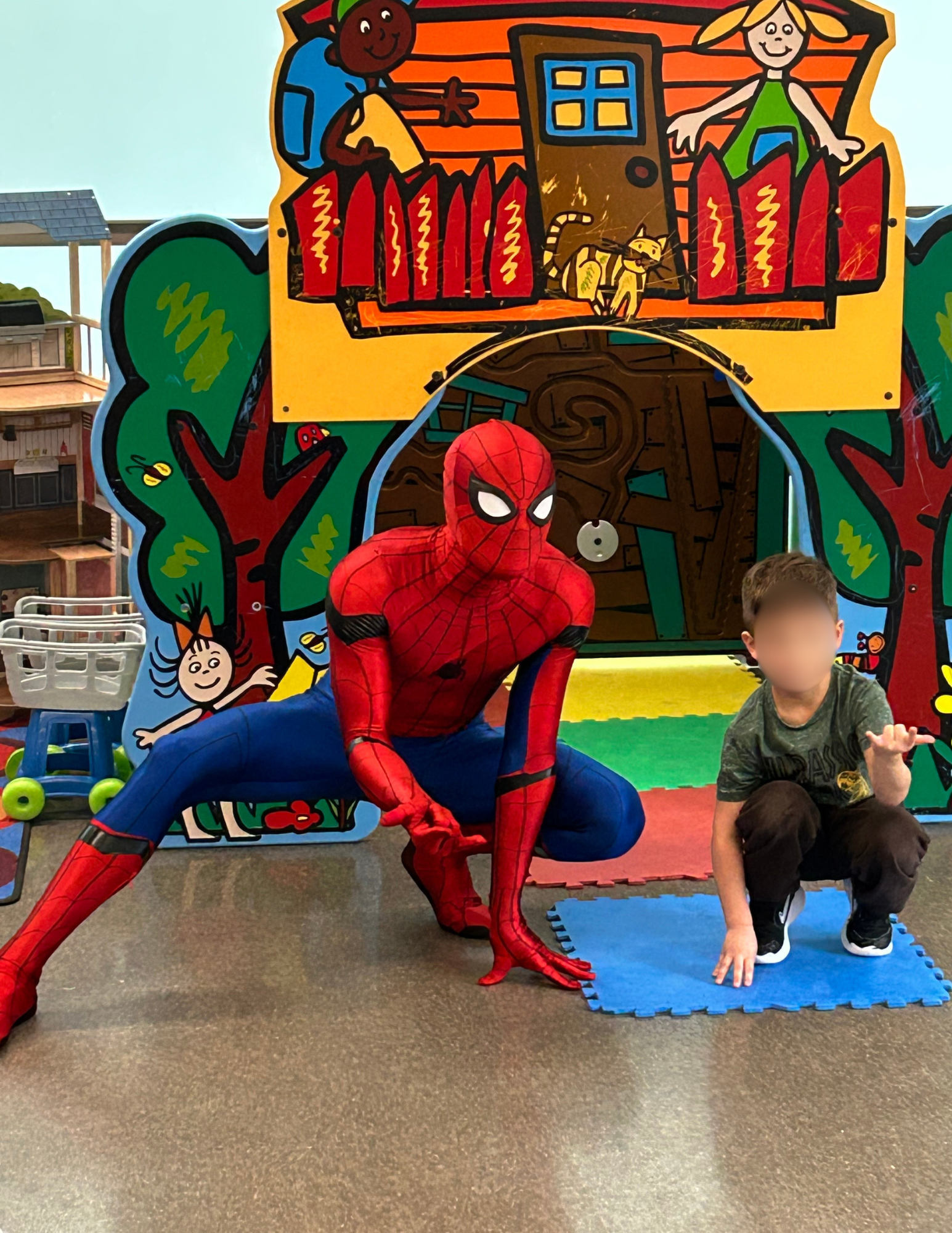 City Slinger posing with a child at a birthday party